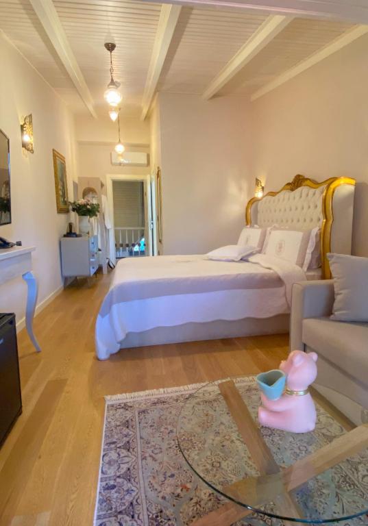 Postel nebo postele na pokoji v ubytování Le prince Rooms