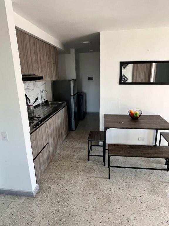 Kuchyň nebo kuchyňský kout v ubytování Apartamento Cerca Al Malecón Del Rio
