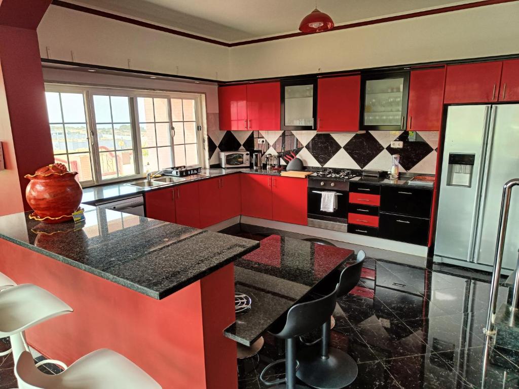 Kuchyň nebo kuchyňský kout v ubytování Casa Miami