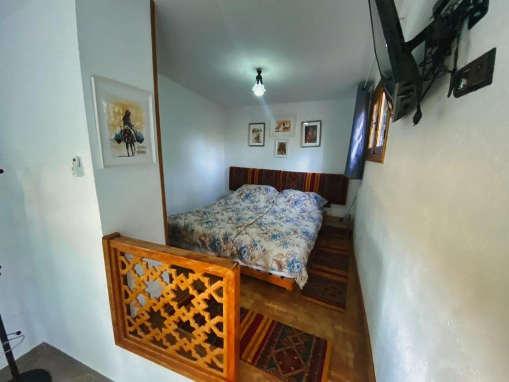 Postel nebo postele na pokoji v ubytování Gîte rural à Jnane Imass
