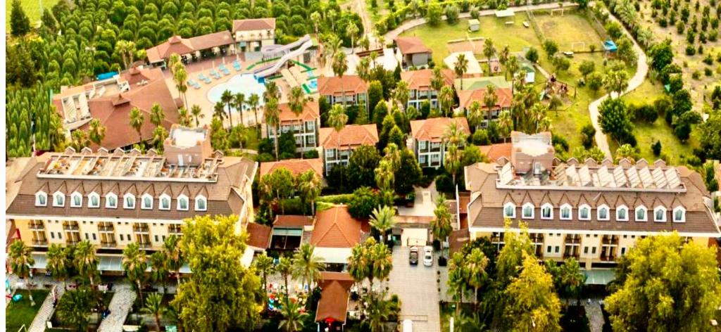 an aerial view of a large building with a resort at MIR'AMOR GARDEN Resort Hotel-ALL INCLUSIVE in Antalya