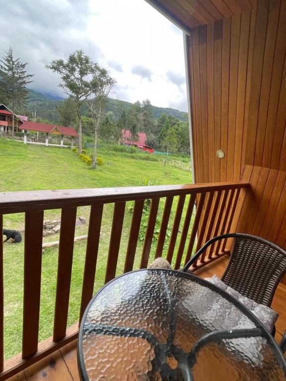 Balkón nebo terasa v ubytování Cabaña Alpina Yanesh Haus