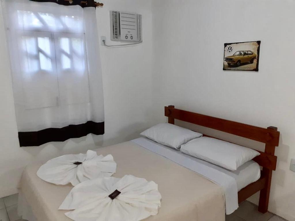 Postel nebo postele na pokoji v ubytování Bromelias Imbassai