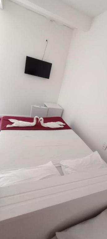 Postel nebo postele na pokoji v ubytování Bromelias Imbassai