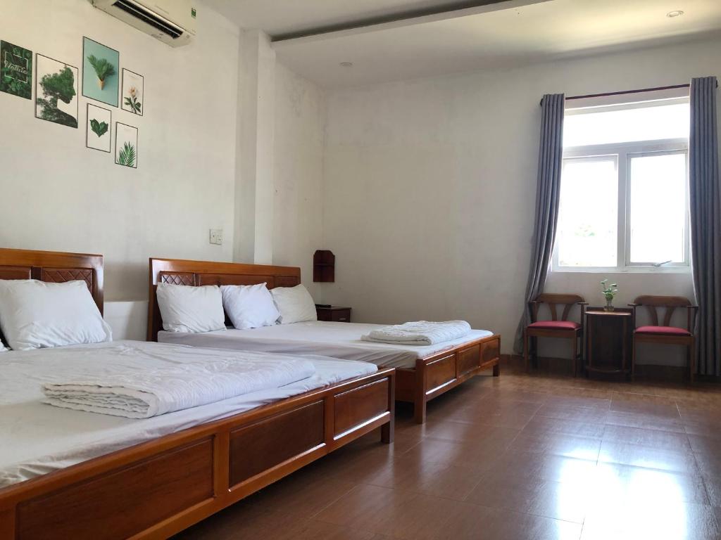 Postel nebo postele na pokoji v ubytování Motel Minh Thảo