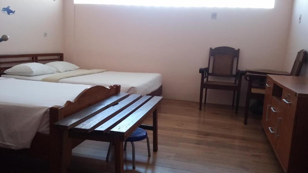 Postel nebo postele na pokoji v ubytování Peye Guesthouse