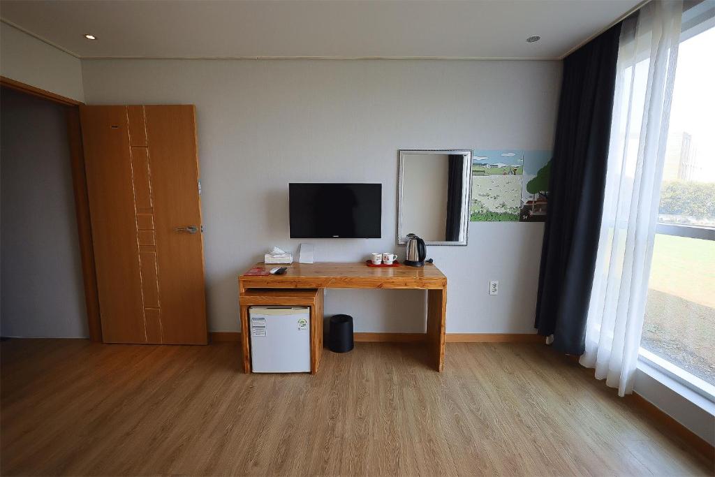 TV a/nebo společenská místnost v ubytování Dodubong Stay Hotel