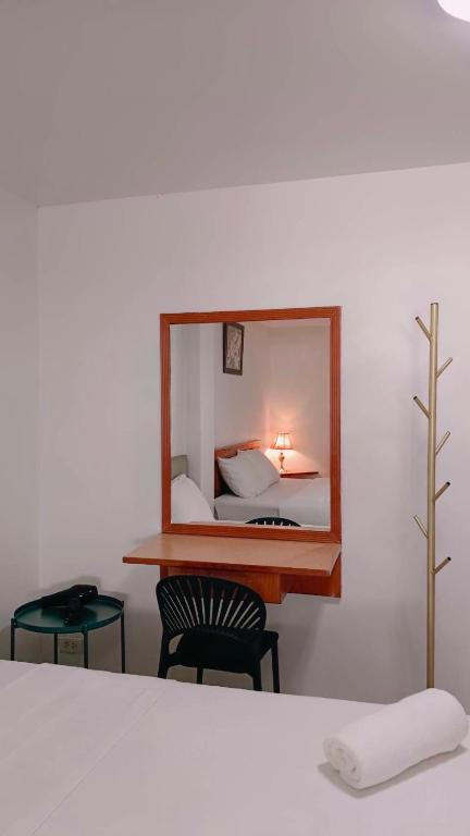 Postel nebo postele na pokoji v ubytování Convenient Resort