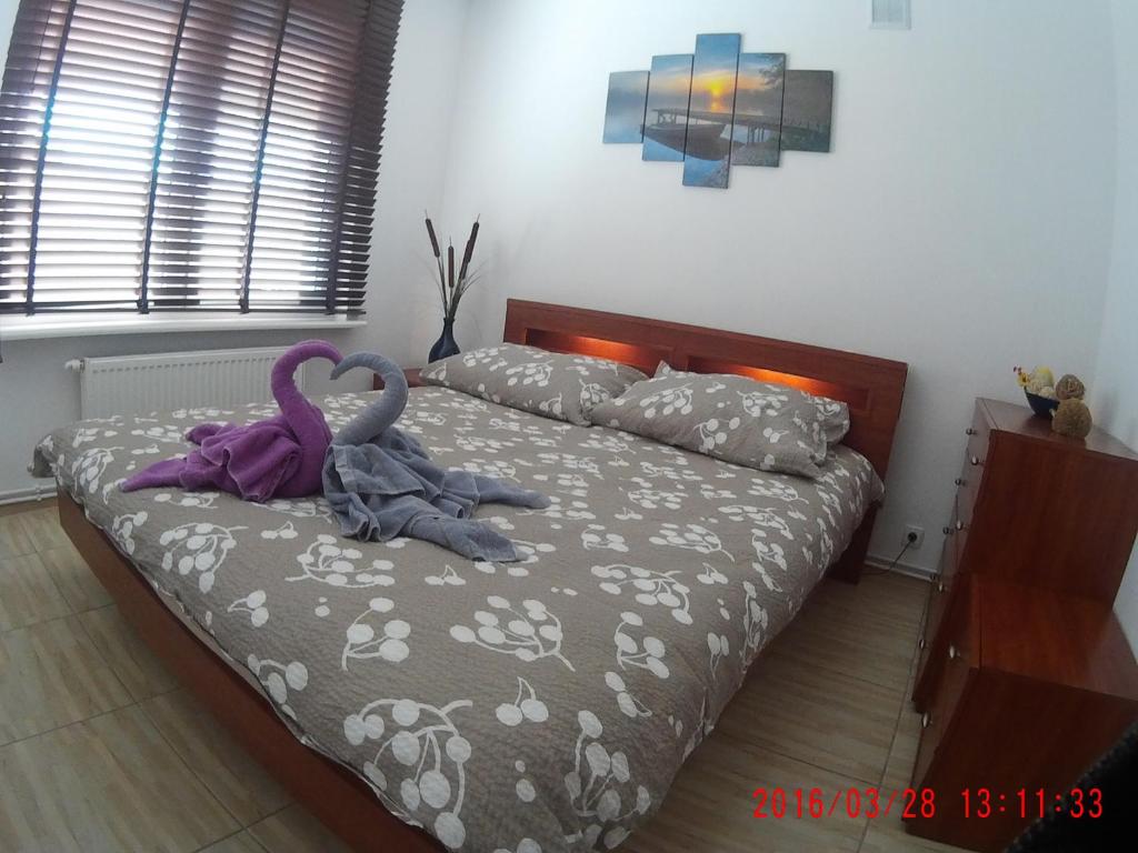 Posteľ alebo postele v izbe v ubytovaní Apartament Masovia