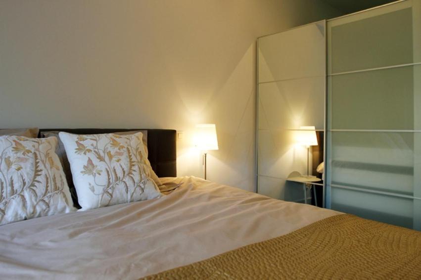 Postel nebo postele na pokoji v ubytování Parc Brussels Apartment