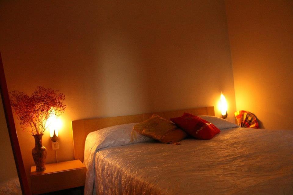 A bed or beds in a room at Casa Radiosa