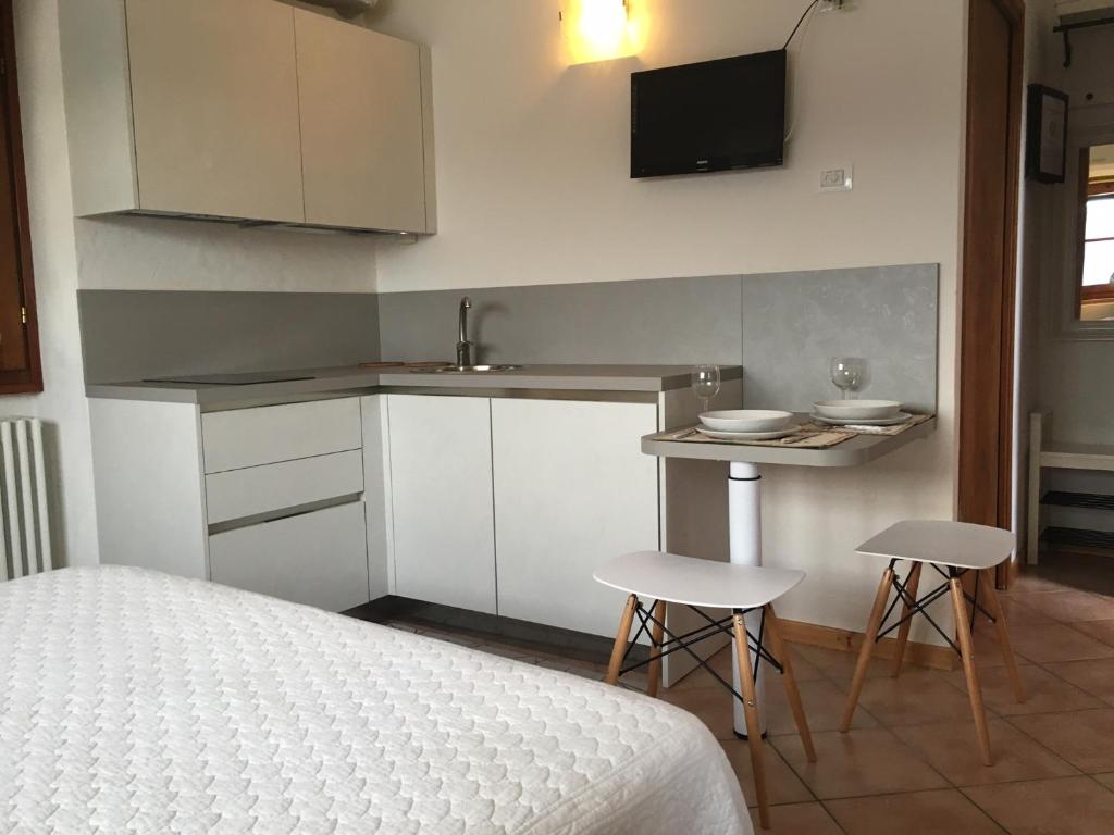 Kuchyň nebo kuchyňský kout v ubytování Residenza Erbaluna