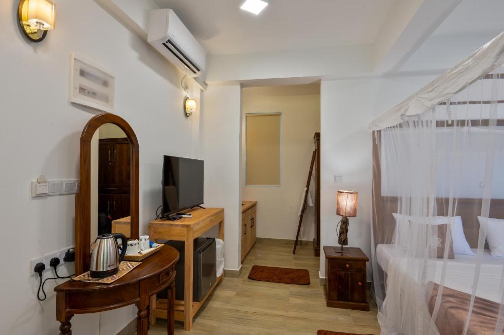 Postel nebo postele na pokoji v ubytování Darigala House