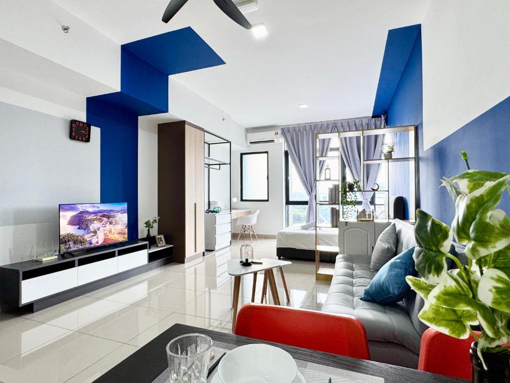 Μια τηλεόραση ή/και κέντρο ψυχαγωγίας στο Alinea Suites