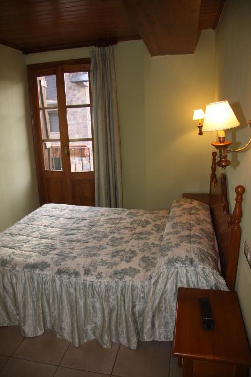 Postel nebo postele na pokoji v ubytování Casa Francho