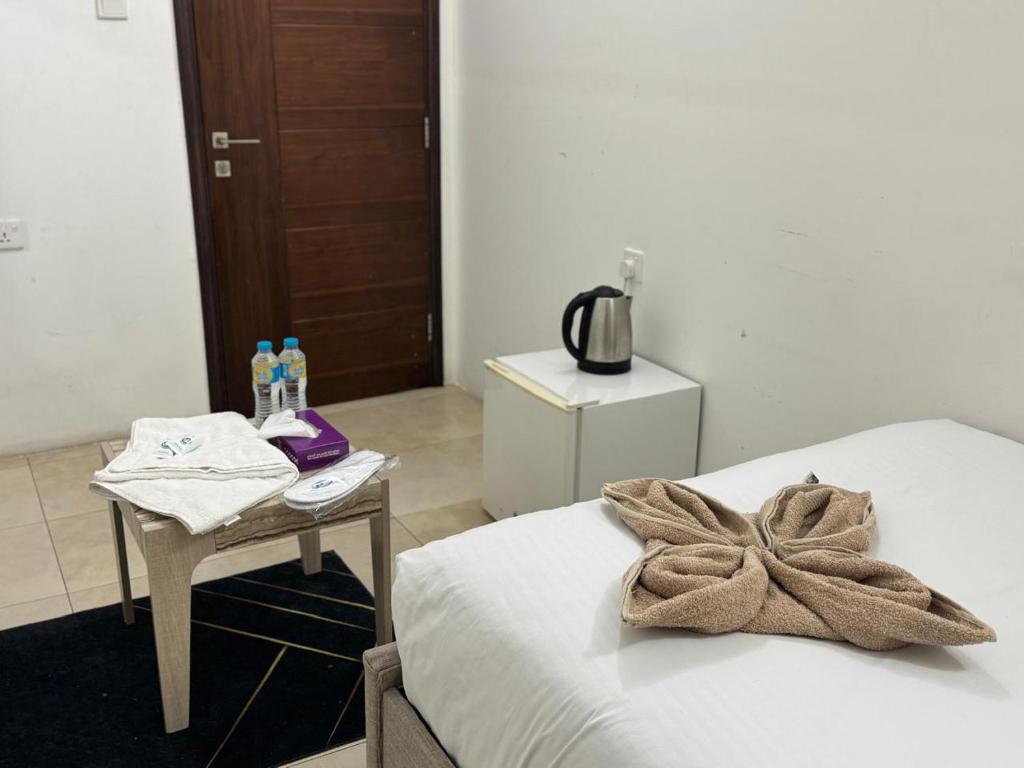 Postel nebo postele na pokoji v ubytování Prestige Luxury Abu Dhabi