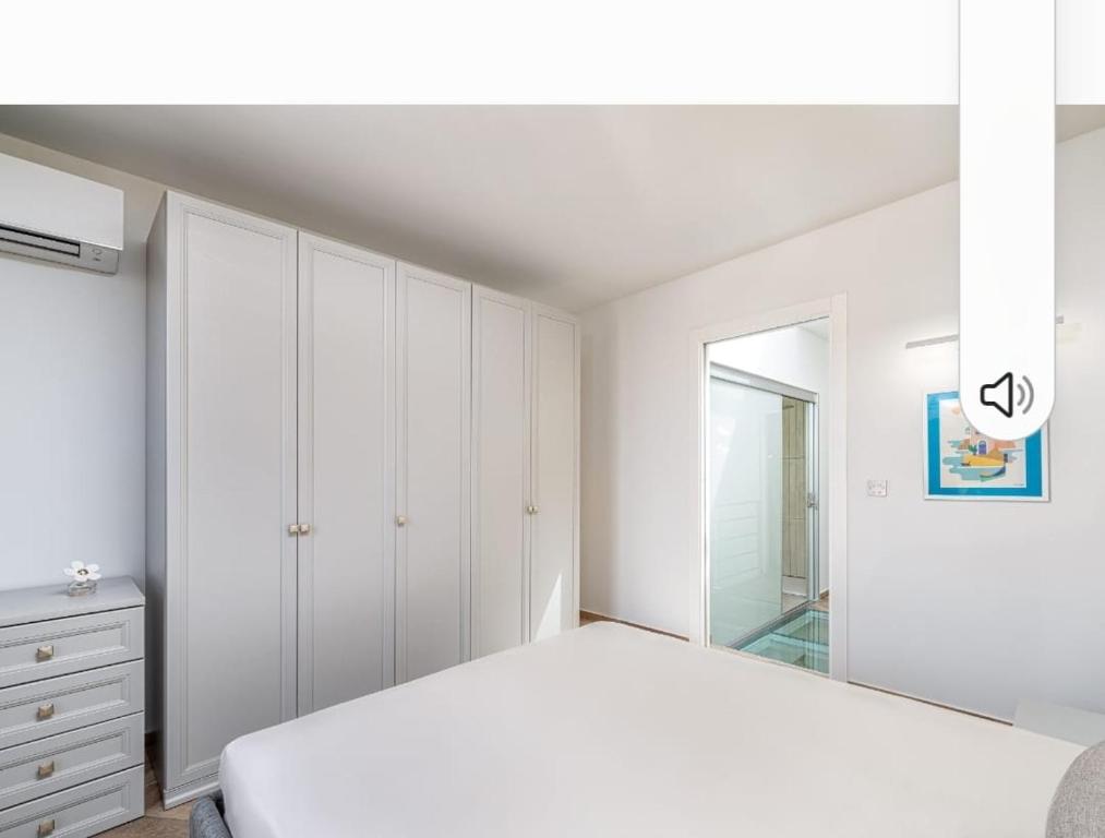 Postel nebo postele na pokoji v ubytování Melita Breeze House