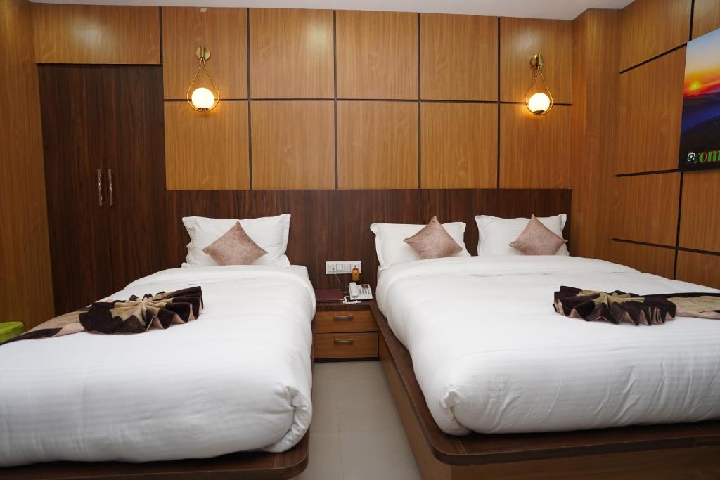 Postel nebo postele na pokoji v ubytování Hotel Faben Inn