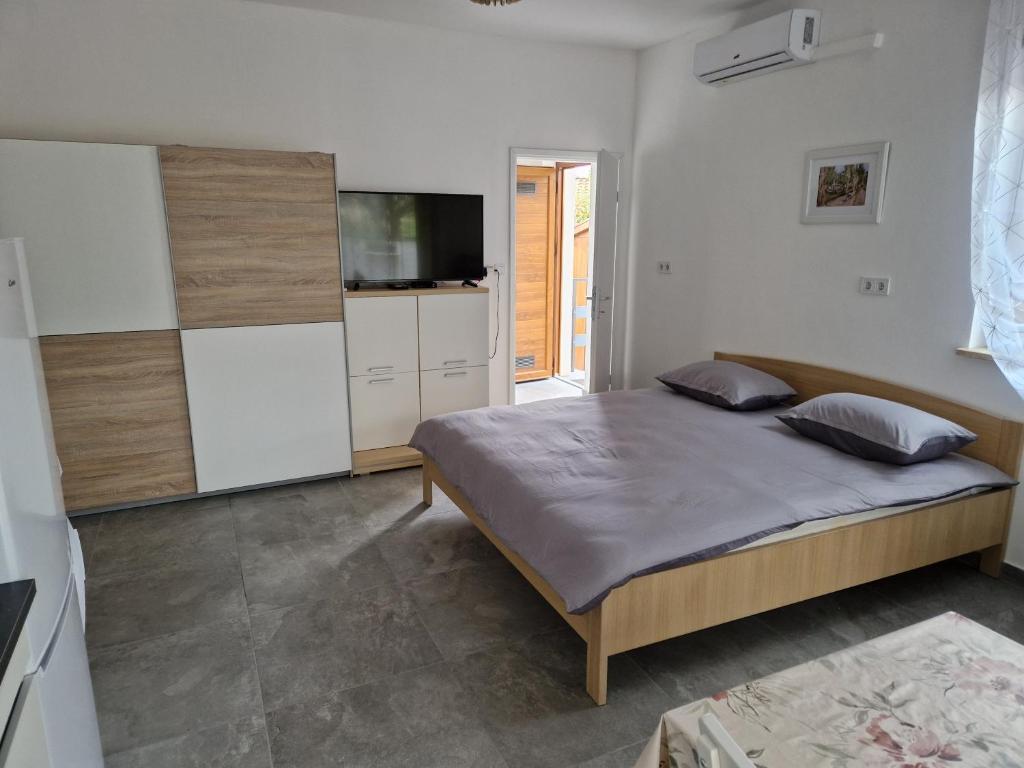 Ένα ή περισσότερα κρεβάτια σε δωμάτιο στο Villa Müller