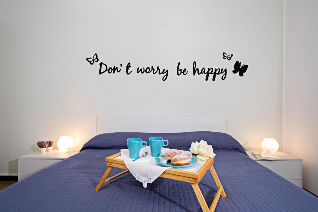 En eller flere senge i et værelse på VILLA VALESANA - Regarda Travel