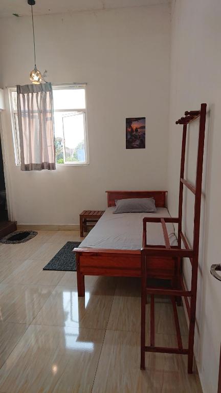 Postel nebo postele na pokoji v ubytování CANAAN MUSIC Hotel