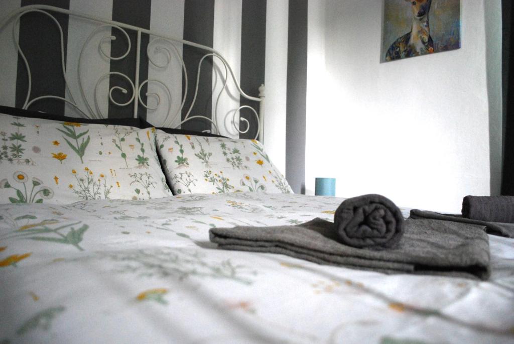 Postel nebo postele na pokoji v ubytování Le stanze di Alicam