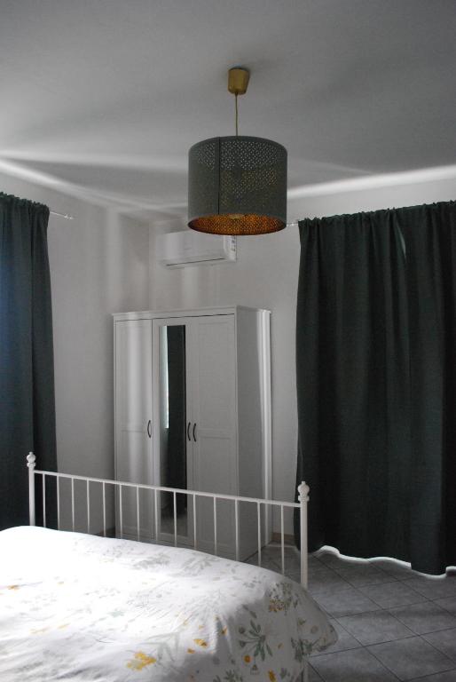 Postel nebo postele na pokoji v ubytování Le stanze di Alicam