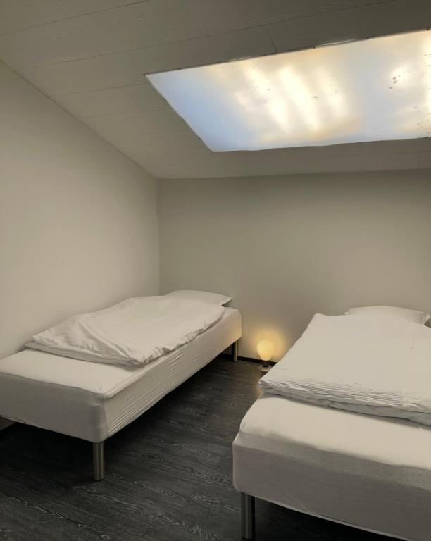 Postel nebo postele na pokoji v ubytování B&B Saga