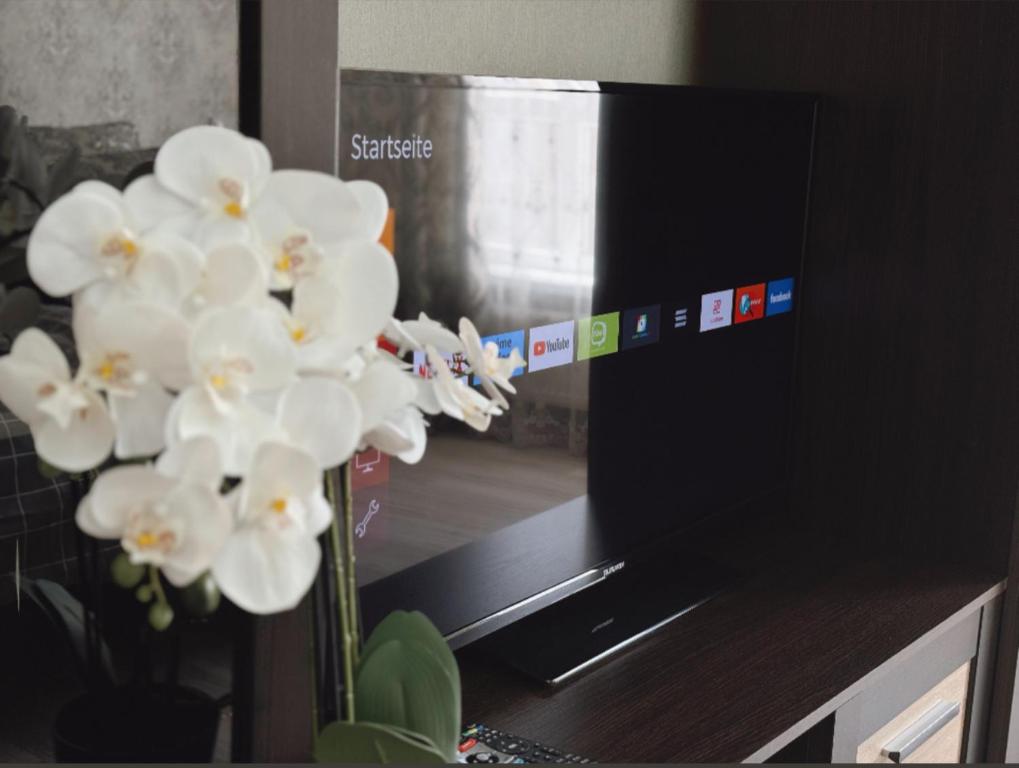 Μια τηλεόραση ή/και κέντρο ψυχαγωγίας στο Luxury Sweet Apartment