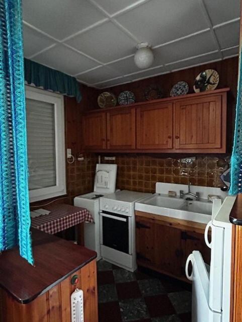 Kuchyň nebo kuchyňský kout v ubytování Villa DOMINO