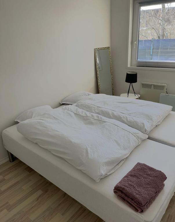 Postel nebo postele na pokoji v ubytování B&B Saga