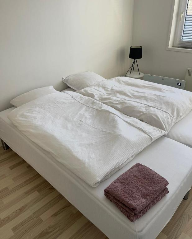 Postel nebo postele na pokoji v ubytování B&B Saga