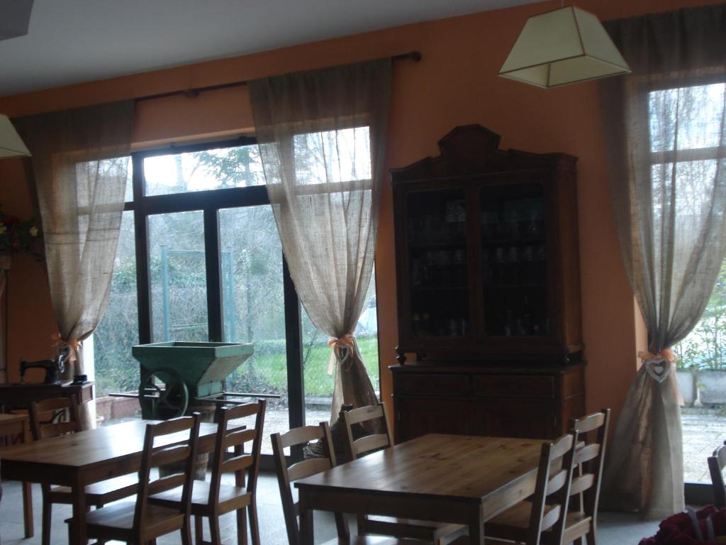 TV a/nebo společenská místnost v ubytování Rio Verde camping villaggio