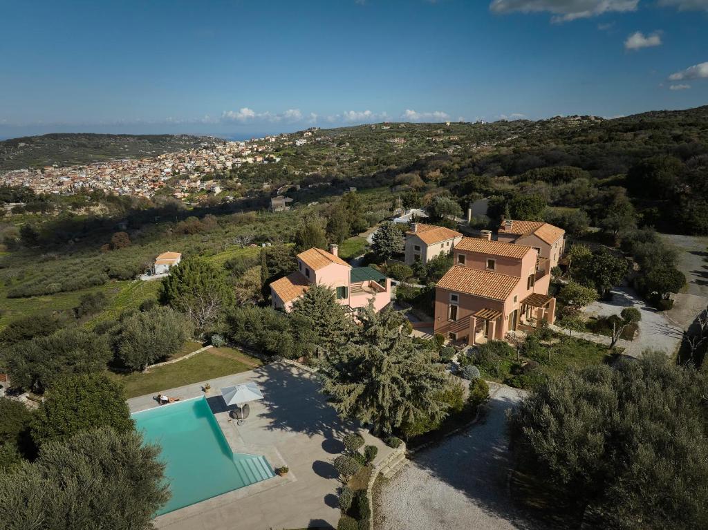 an aerial view of a house with a swimming pool at Eliathos Hillside Retreat in Archanes