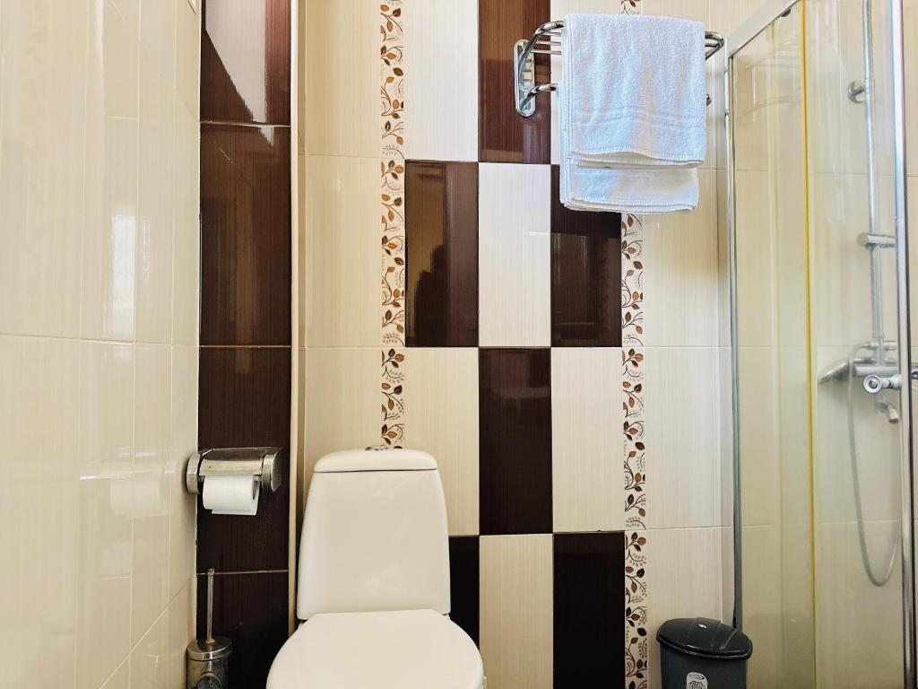 Koupelna v ubytování SD Hotel