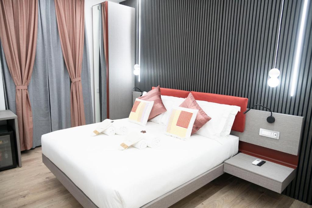 Postel nebo postele na pokoji v ubytování Teulada Luxury Rooms