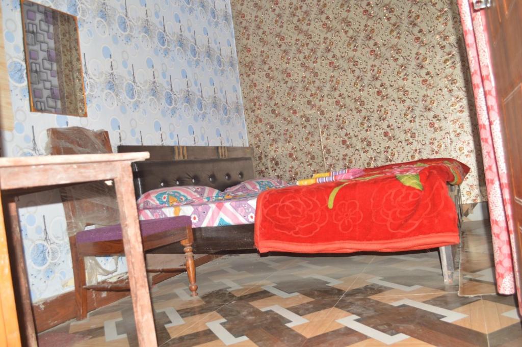 Voodi või voodid majutusasutuse Ayodhya Dham Guest House toas