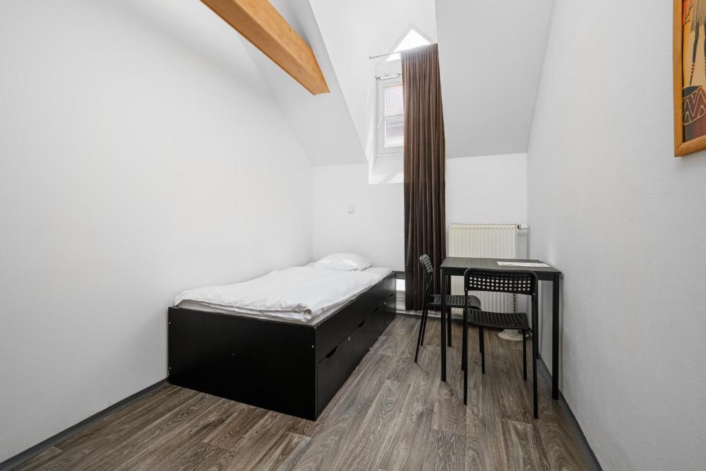 
Single Room with Shower and Shared External Toilet
