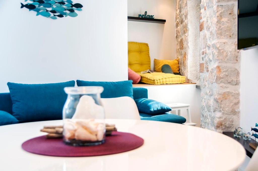 Χώρος καθιστικού στο Apartmani De Amicis