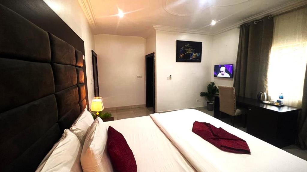 Postel nebo postele na pokoji v ubytování hotel Guidotti