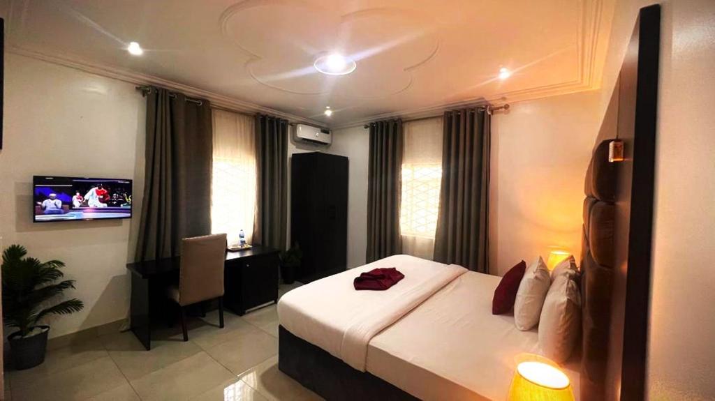Postel nebo postele na pokoji v ubytování hotel Guidotti