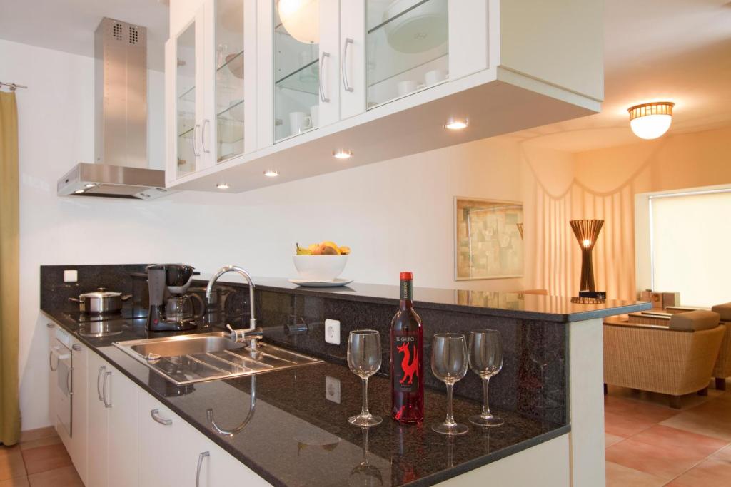 A kitchen or kitchenette at Playitas Villas - Sports Resort