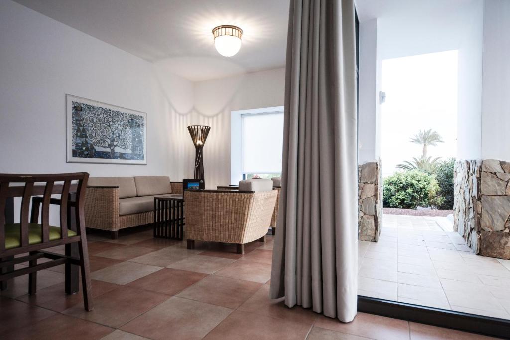 A seating area at Playitas Villas - Sports Resort