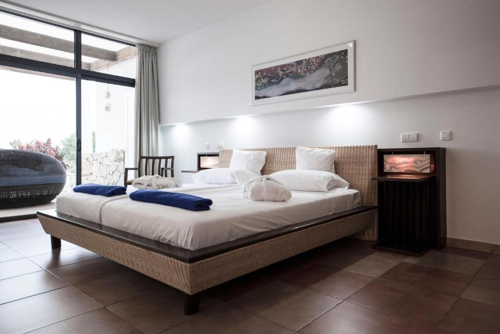 A bed or beds in a room at Playitas Villas - Sports Resort