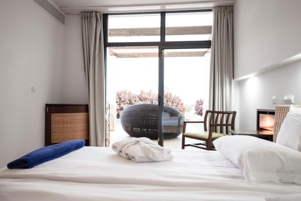 A bed or beds in a room at Playitas Villas - Sports Resort