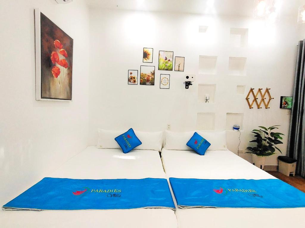 Postel nebo postele na pokoji v ubytování Paradies Homestay