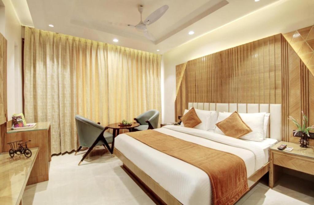 Postel nebo postele na pokoji v ubytování Hotel Platinum With Free Pickup-Delhi Airport