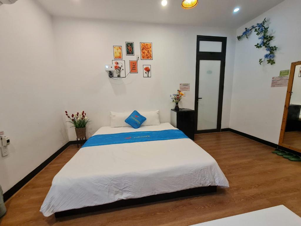 Postel nebo postele na pokoji v ubytování Paradies Homestay
