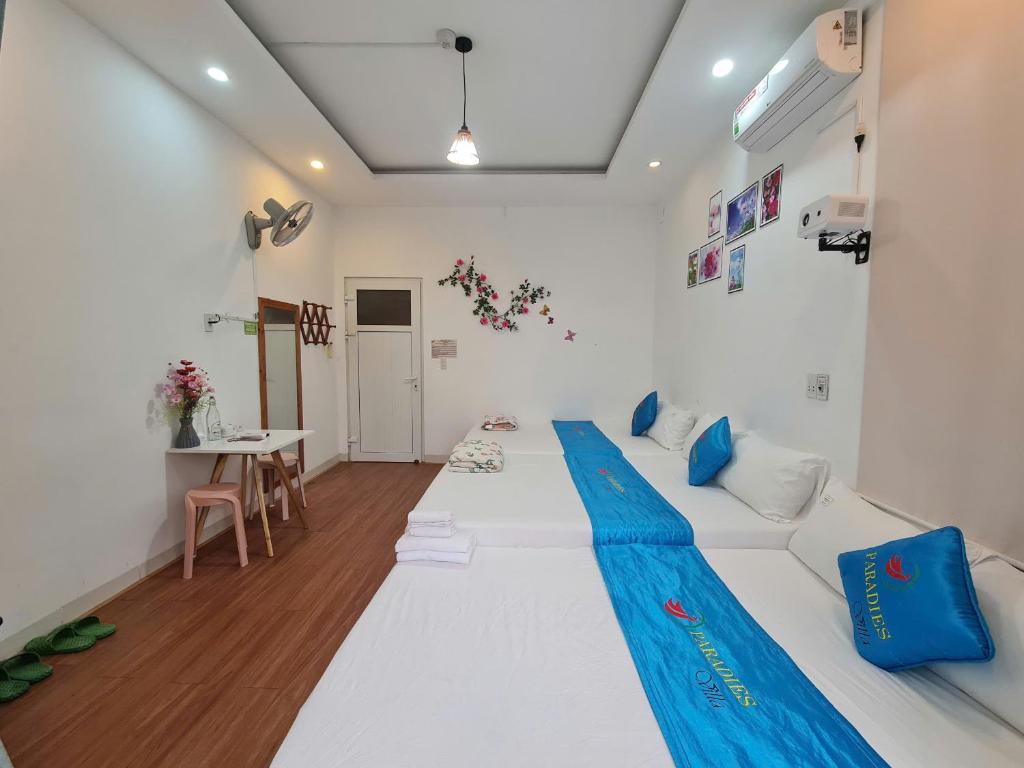 Postel nebo postele na pokoji v ubytování Paradies Homestay