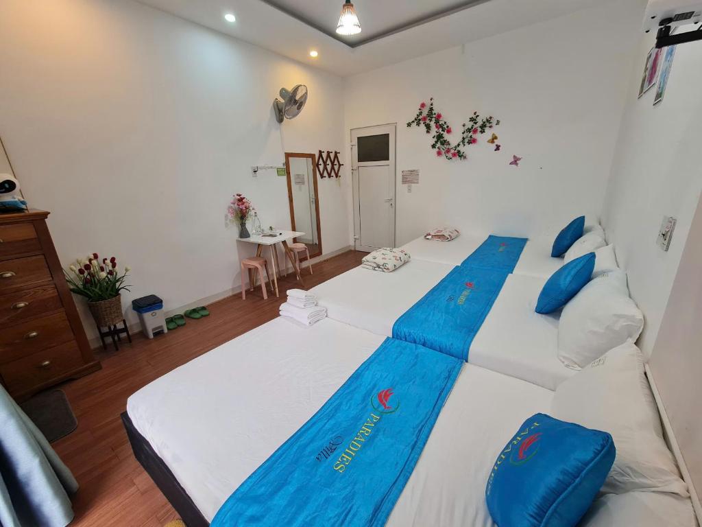 Postel nebo postele na pokoji v ubytování Paradies Homestay